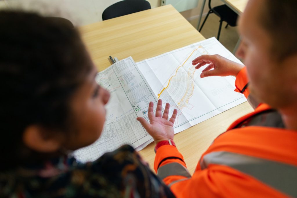 A land surveyor explaining how boundary surveys work