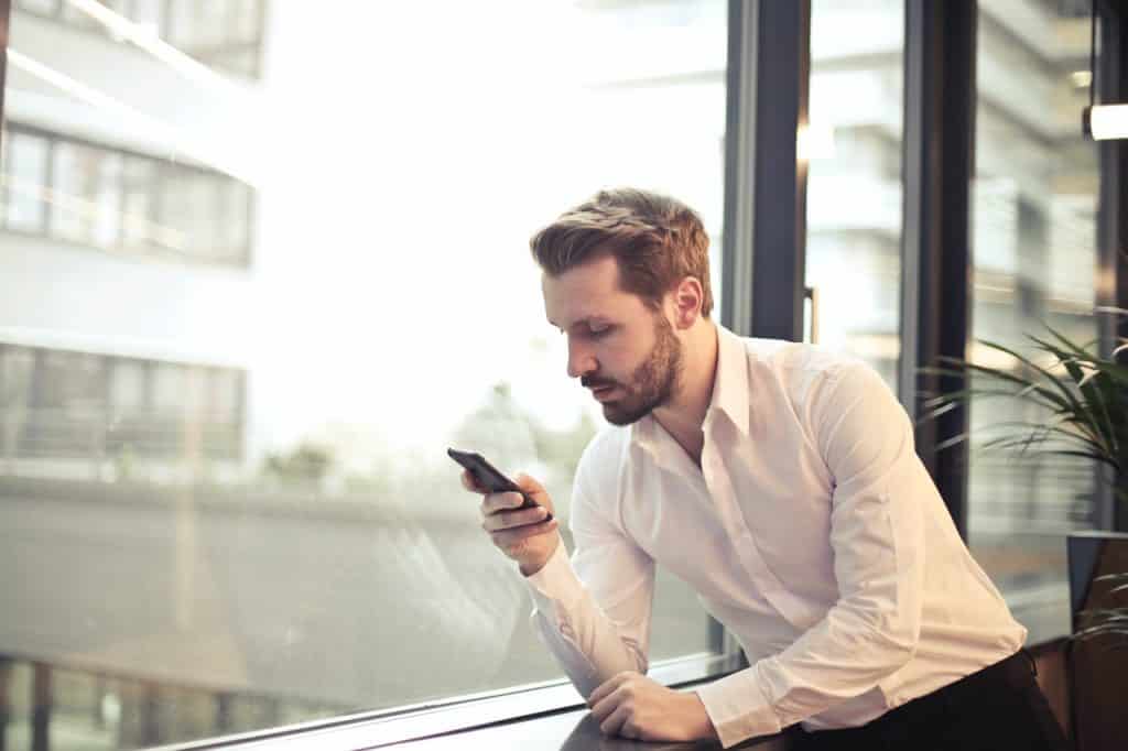 a man making a phone call on his mobile phone