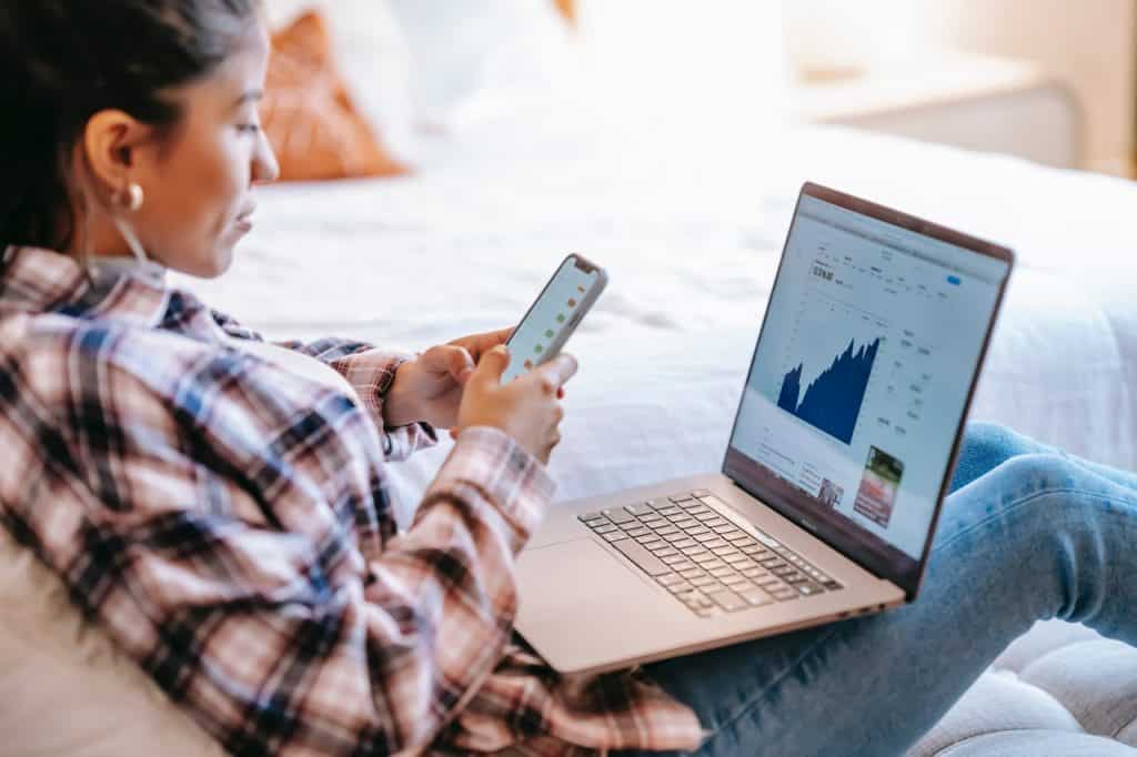 woman checking the status of her investments
