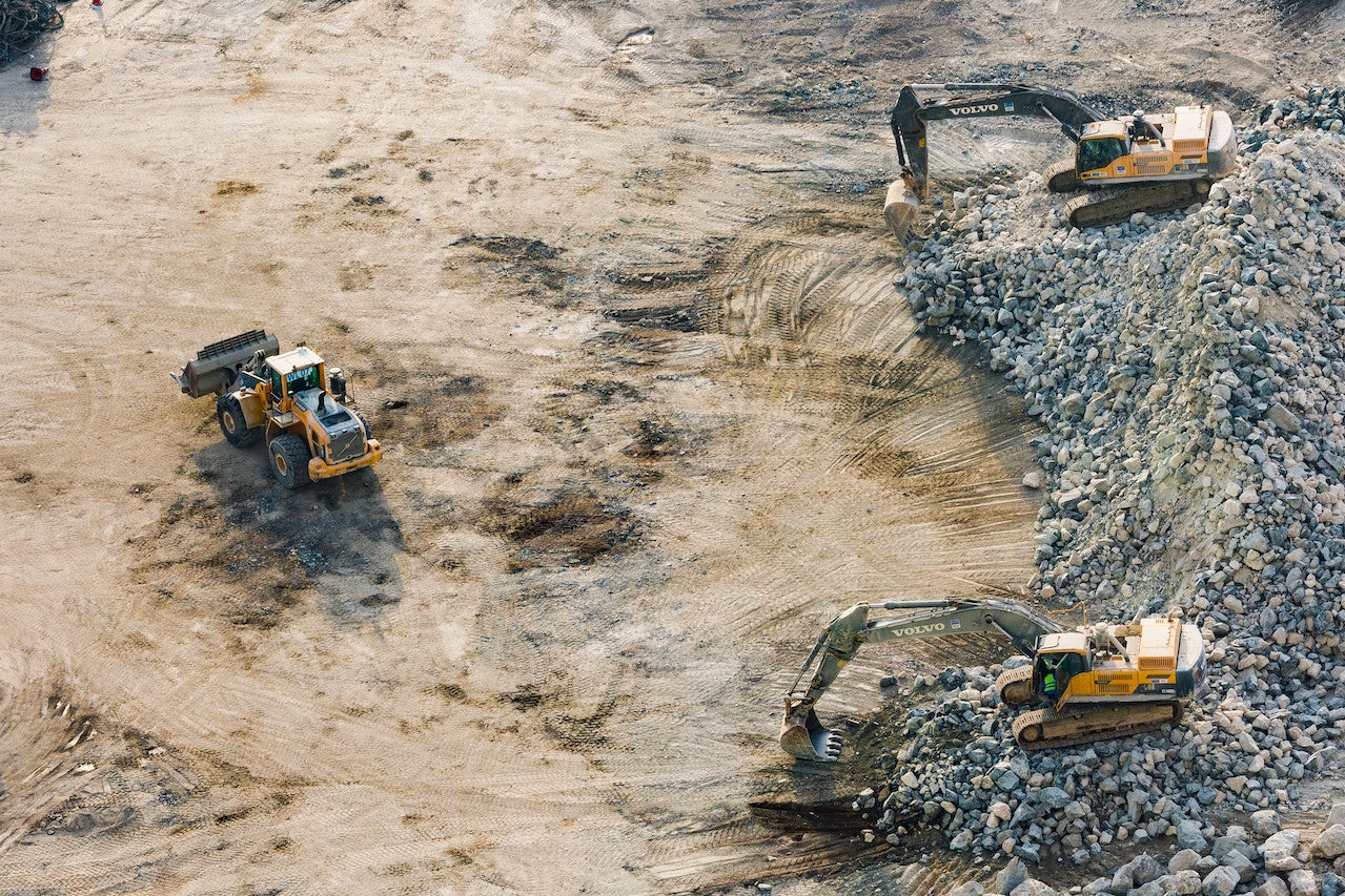 bulldozer cleaning up land for commercial development