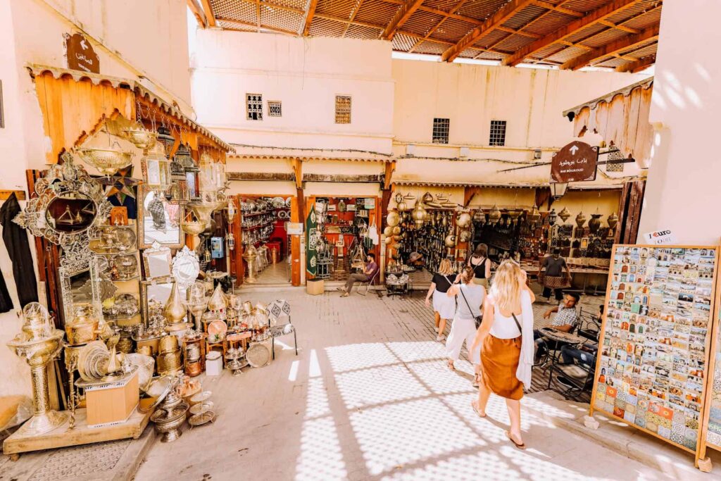 people walking in a market in a commercial zone