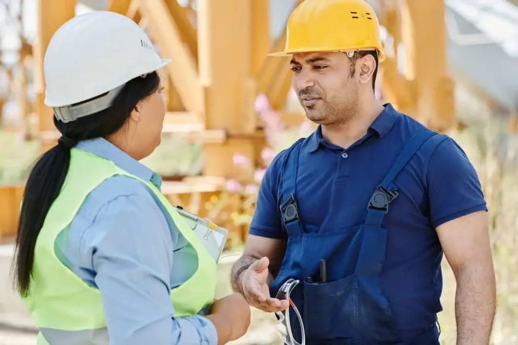 Property buyer and seller discussing survey costs through Millman National Land Services