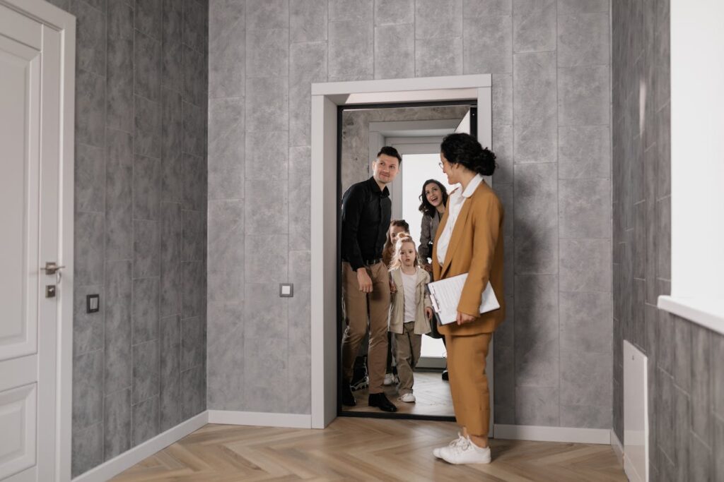 a family having a house tour
