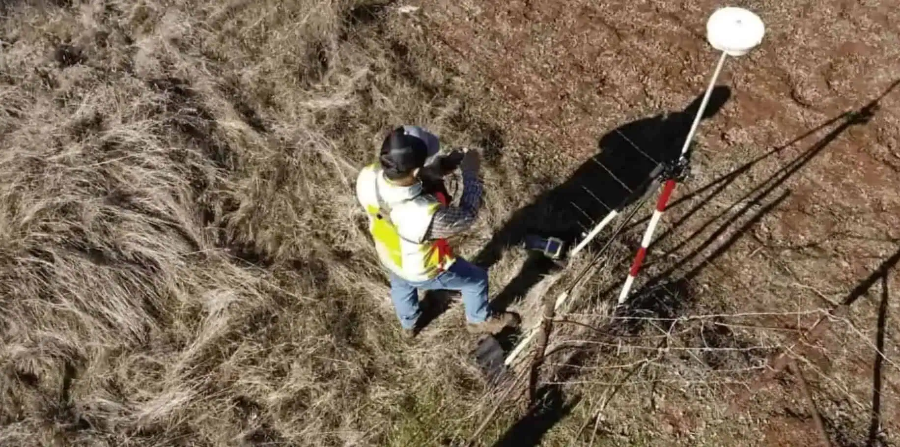 man doing land survey
