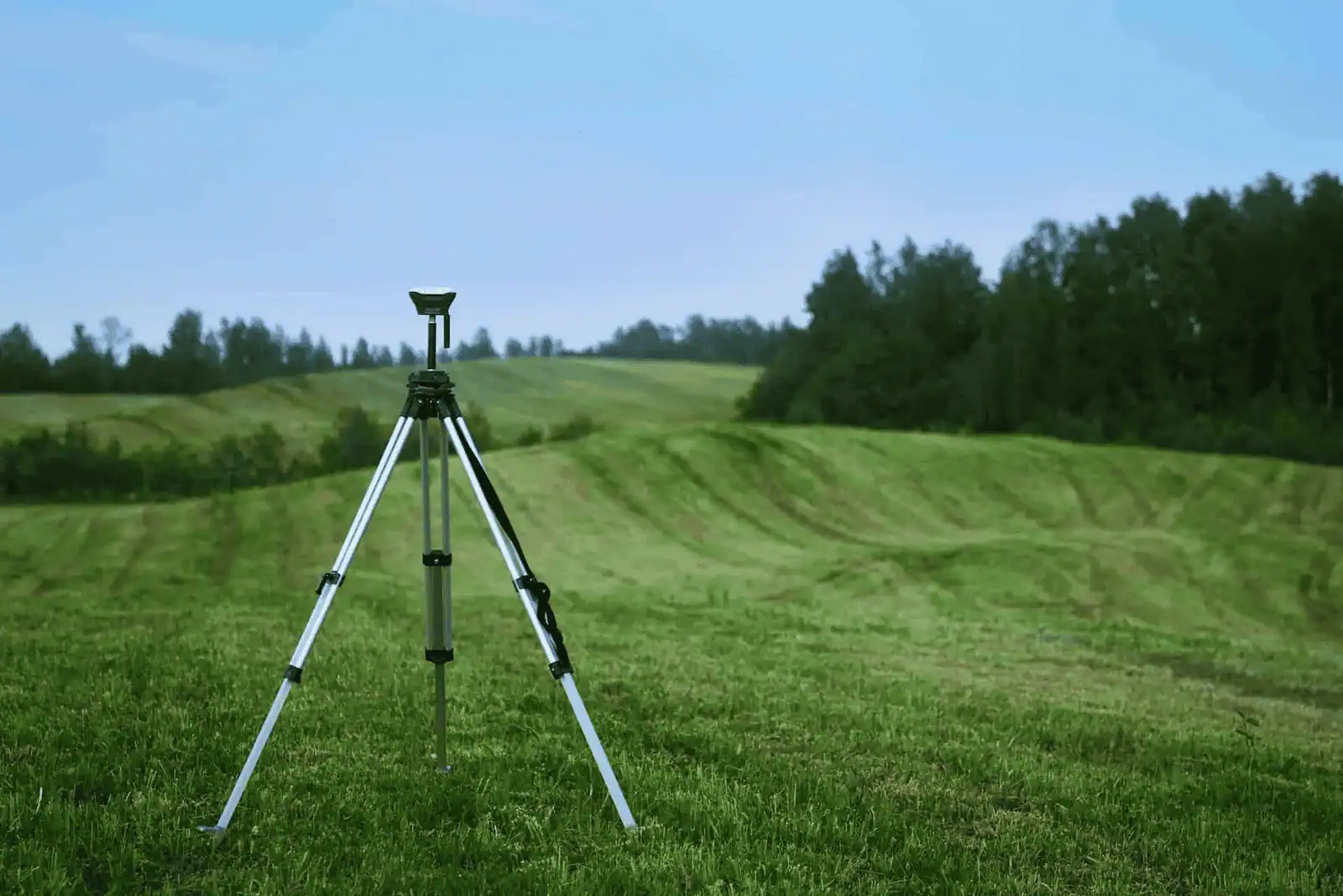 land survey equipment on field